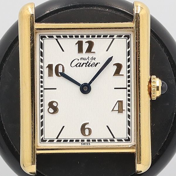 Cartier Must Tank Vermeil Womens Quartz Watch White Dial Square Case: Cartier Must Tank Vermeil Womens Quartz Watch White Dial Square Case Pre-owned Cartier Must Tank Vermeil ladies wristwatch with a square case, white dial, and quartz movement. The watch is made in Swi