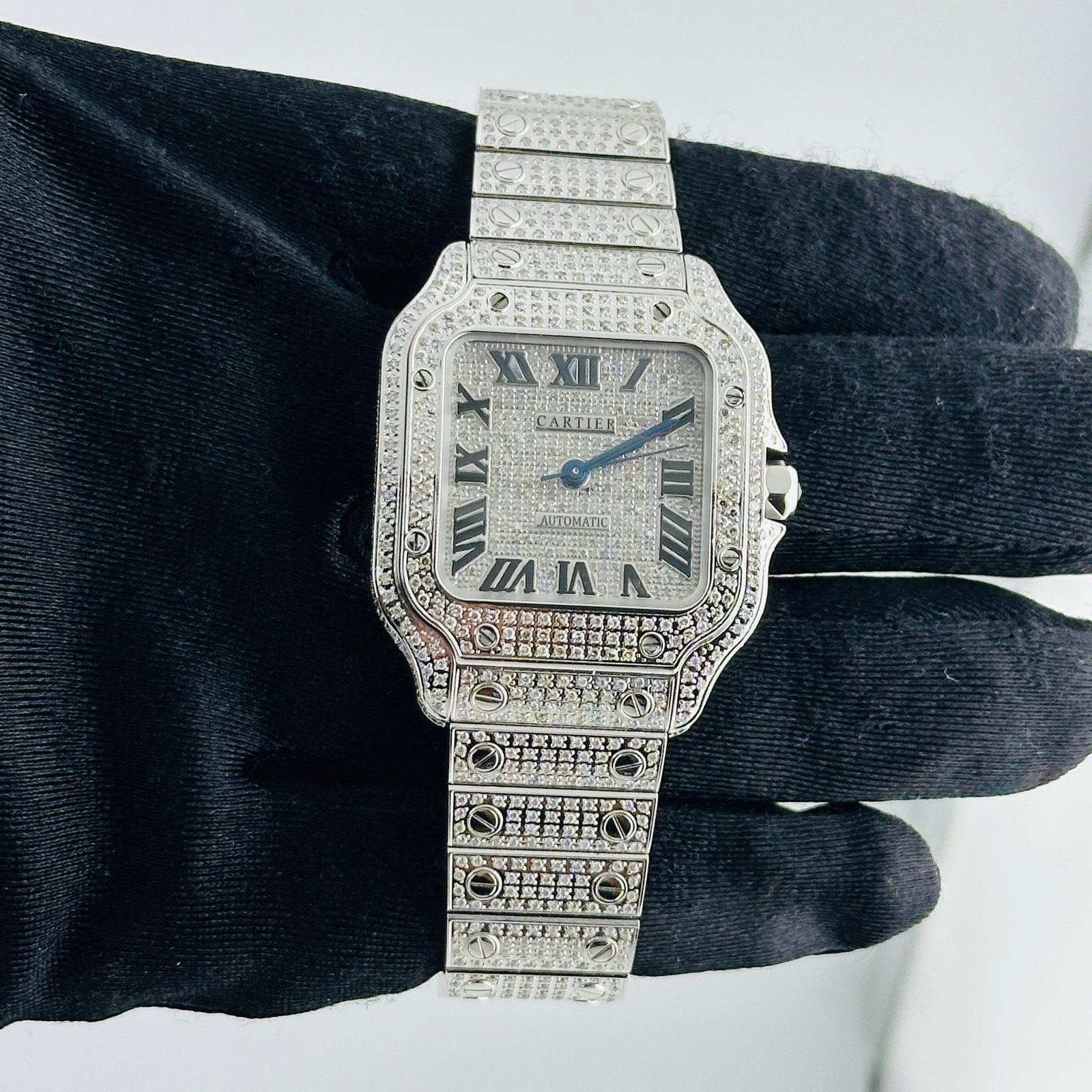 Cartier Santos Medium Ref 4075 Unisex Watch with Diamond Roman Dial and Bracelet: Cartier Santos Medium Ref 4075 Unisex Watch with Diamond Roman Dial and Bracelet This Cartier Santos Medium watch features a diamond Roman dial, a diamond-set bezel, and a diamond bracelet. Designed f