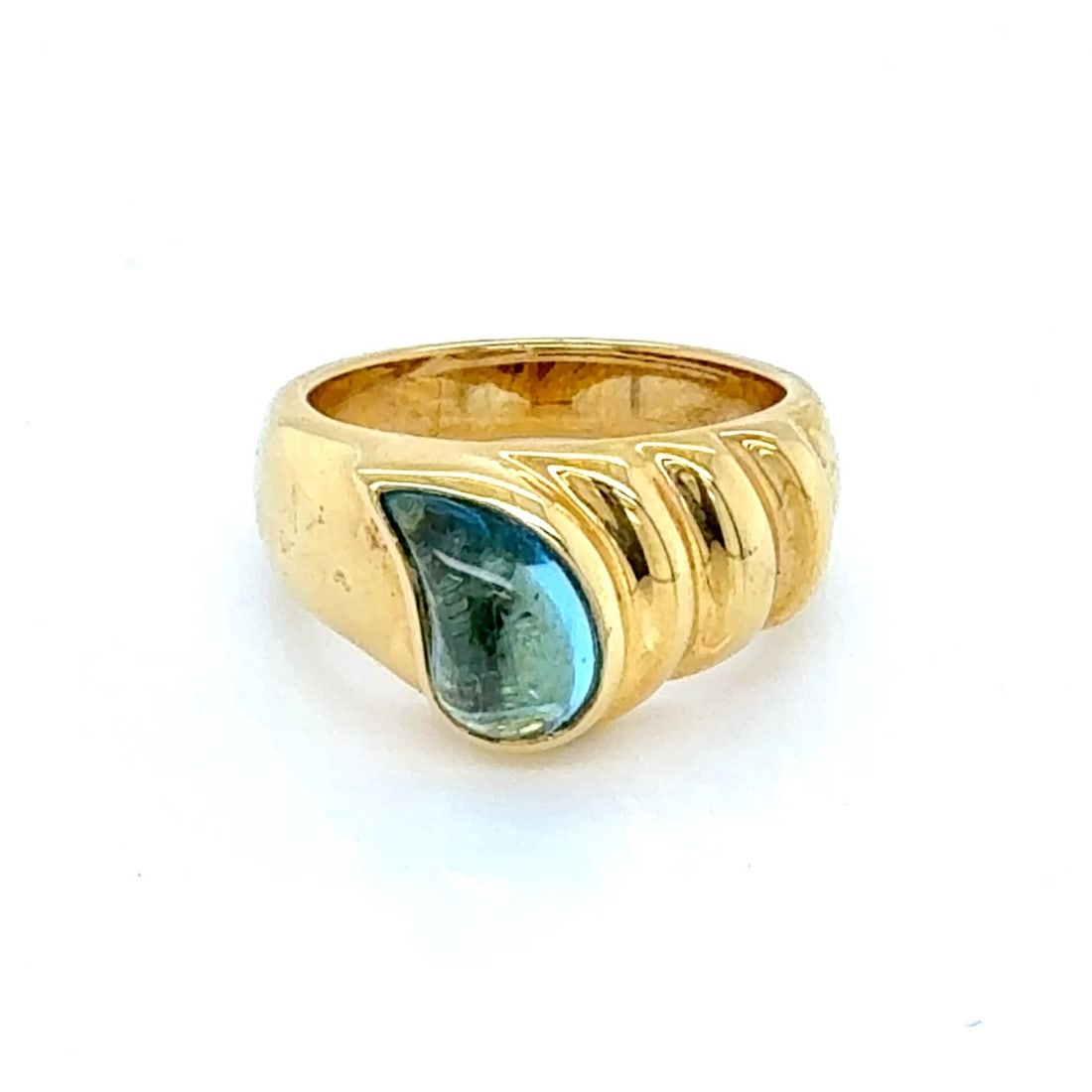 Chopard Tear Drop Ring 18k Yellow Gold Blue Topaz Size 5.5: Chopard Tear Drop Ring 18k Yellow Gold Blue Topaz Size 5.5 Pre-owned original Chopard Tear Drop Blue Topaz ring crafted in 18k yellow gold. This fine jewelry piece features a natural pear-shaped blue 