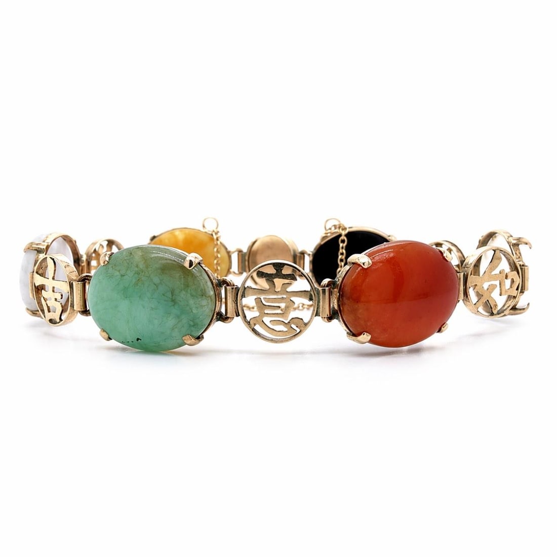 Jade Bracelet in 14K Yellow Gold with Six Stones 7 Inch: Jade Bracelet in 14K Yellow Gold with Six Stones 7 Inch This bracelet features six jade stones set in 14K yellow gold. It weighs 14.3 grams and measures 7 inches in length. The item is pre-owned. Spec