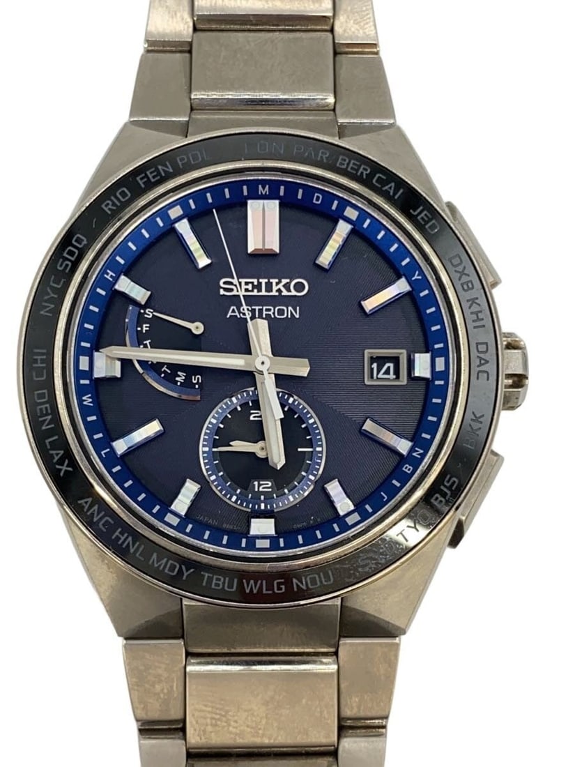 Seiko Astron Nexter Titanium Navy Wristwatch SBXY051: Seiko Astron Nexter Titanium Navy Wristwatch SBXY051 This Seiko Astron Nexter SBXY051/8B63-0BD0 men's wristwatch features a navy dial housed in a durable titanium case. Designed for men, this pre-owne