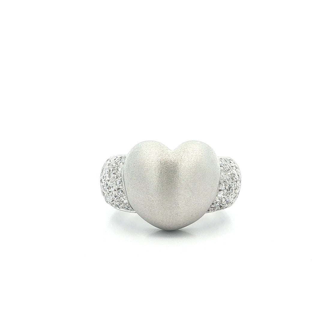 Unbranded 18k White Gold Heart Ring with 0.70ctw Diamond Accents: Unbranded 18k White Gold Heart Ring with 0.70ctw Diamond Accents Pre-owned women's cocktail ring featuring a puffed heart design with a brushed matte finish and diamond-set shoulders. Crafted in solid
