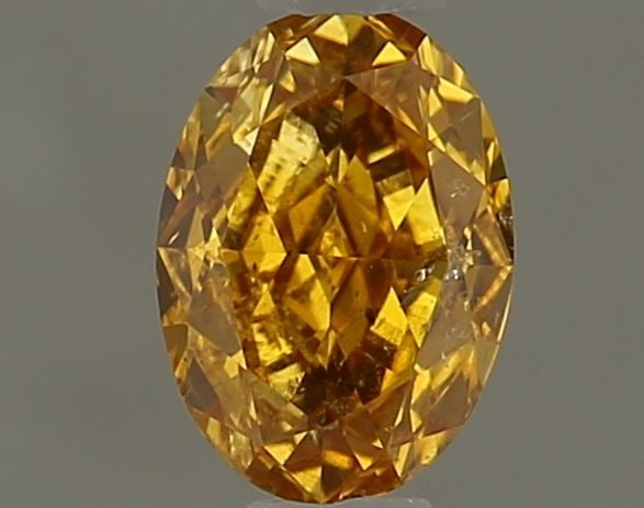Loose Diamond - OVAL 0.41ct Fancy Intense Orange Yellow I1: Loose Diamond - OVAL 0.41ct Fancy Intense Orange Yellow I1 Source: Natural Shape: OVAL Carats: 0.41 Color: Fancy Intense Orange Yellow Certification: GIA Video: