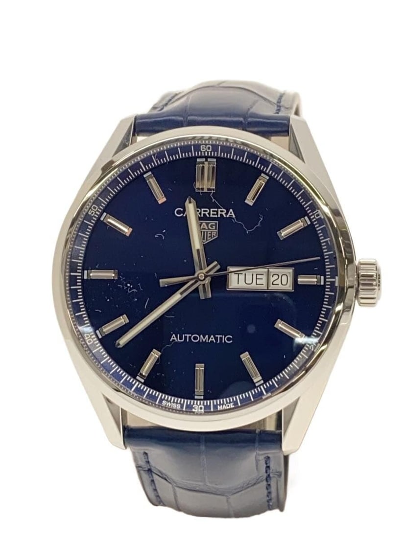 TAG Heuer Carrera Calibre 5 Men's Day-Date Wristwatch: TAG Heuer Carrera Calibre 5 Men's Day-Date Wristwatch This TAG Heuer Carrera Calibre 5 Day-Date men's wristwatch is a Swiss-made timepiece designed for reliability and style. The watch has a pre-owned