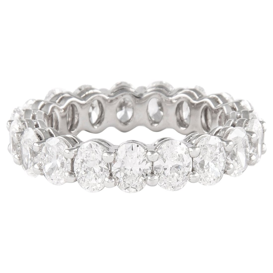 4.54ct Oval Cut Diamond Eternity Band 18k White Gold: 4.54ct Oval Cut Diamond Eternity Band 18k White Gold This stunning oval cut diamond eternity band features 19 oval cut diamonds totaling 4.54 carats, each with approximately F/G color and SI clarity. 