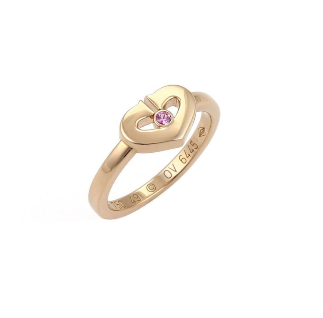 Cartier C Hearts Ring 18k Rose Gold Pink Sapphire Size 4.5 EU 49: Cartier C Hearts Ring 18k Rose Gold Pink Sapphire Size 4.5 EU 49 Authentic Cartier C Hearts ring in 18k rose gold featuring a natural pink sapphire in the collection's interlocking heart-inspired desi