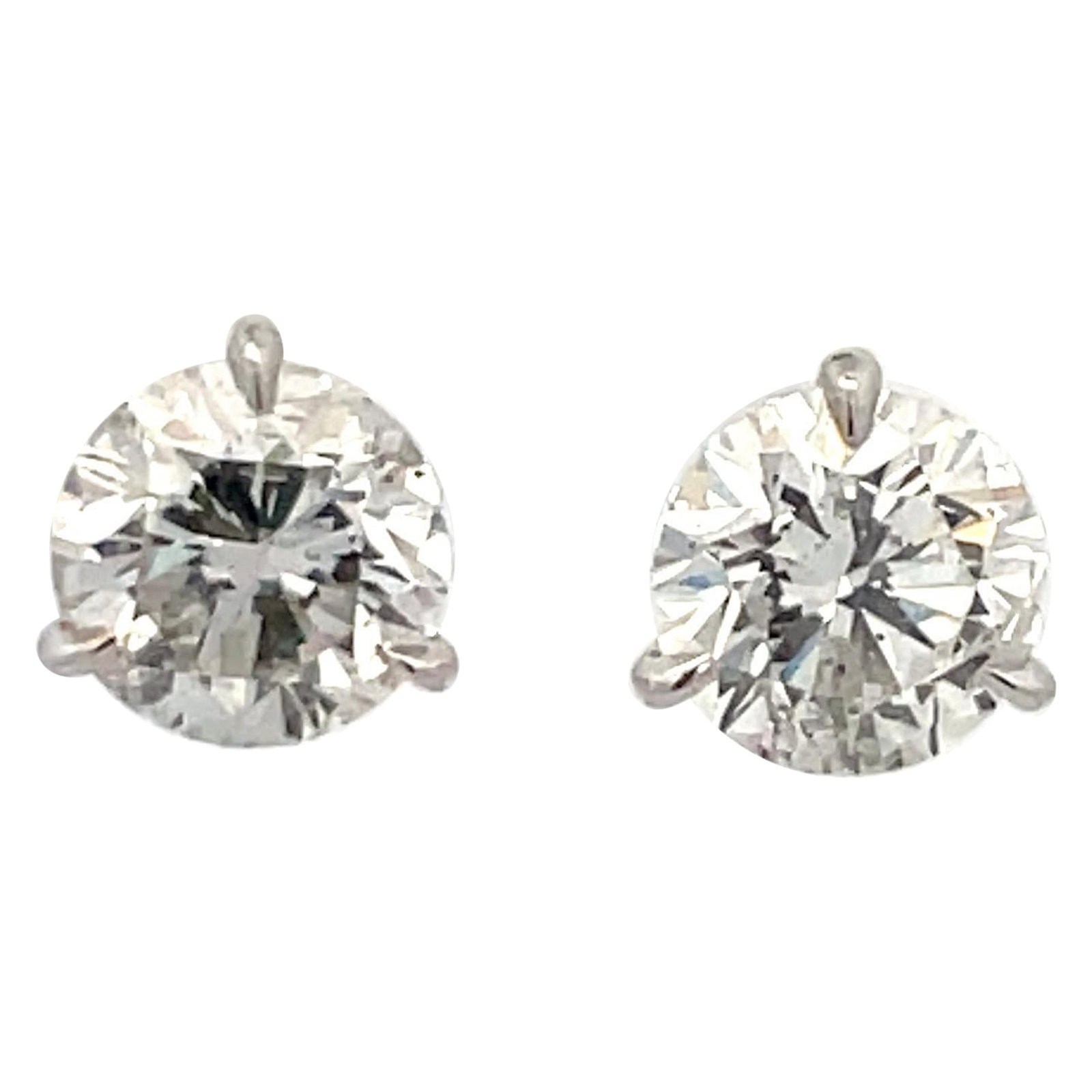 Harbor Diamonds 3.14ct G-H I1 Diamond Stud Earrings in 18K White Gold: Harbor Diamonds 3.14ct G-H I1 Diamond Stud Earrings in 18K White Gold Elevate your elegance with these stunning diamond stud earrings, featuring a total weight of 3.14 carats. Crafted from luxurious 1