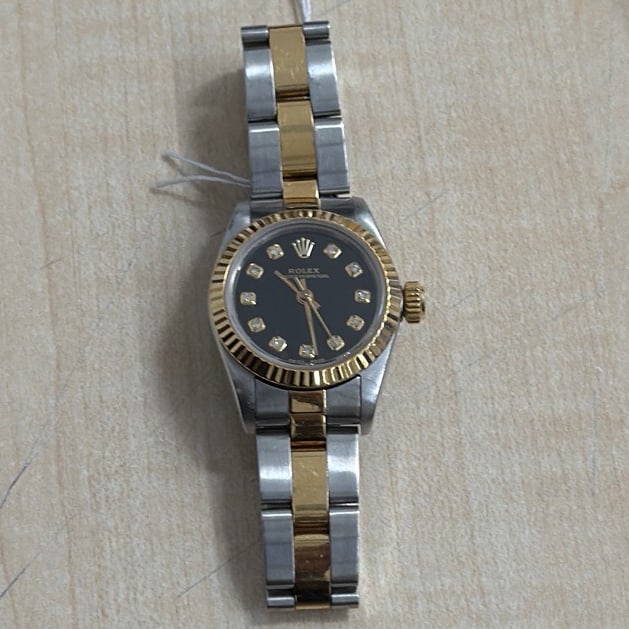 Rolex Oyster Perpetual Ladies Watch Ref. 67193 Aftermarket Black Yellow Diamond Dial: Rolex Oyster Perpetual Ladies Watch Ref. 67193 Aftermarket Black Yellow Diamond Dial Ladies Rolex Oyster Perpetual wristwatch featuring reference 67193 with an Aftermarket black dial and yellow diamon