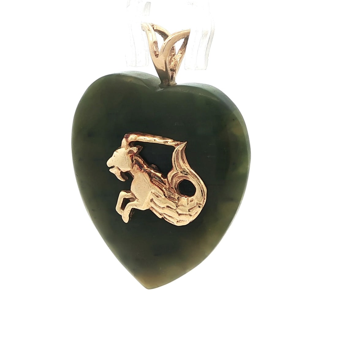Vintage Green Jade Heart Pendant with Yellow Gold Capricorn Zodiac: Vintage Green Jade Heart Pendant with Yellow Gold Capricorn Zodiac This exquisite vintage pendant features a heart-shaped natural jade stone in a rich medium to dark green color, symbolizing the Capri