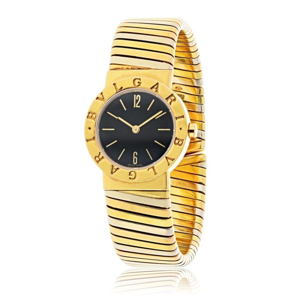 Bvlgari BB 26 2T 18K Two Tone Vintage Quartz Watch Circa 1990: Bvlgari BB 26 2T 18K Two Tone Vintage Quartz Watch Circa 1990 This exquisite Bvlgari BB 26 2T cuff watch from the 1990s showcases the brand's iconic design ethos. Crafted from 18K two-tone gold, it fe