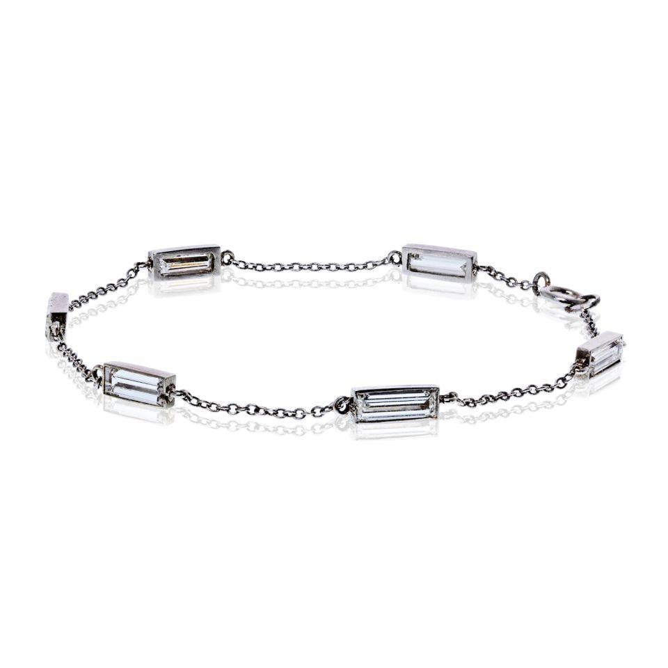 Platinum Chain Bracelet with 6 Straight Baguette Diamonds 1.57 Cts 6.5 inches: Platinum Chain Bracelet with 6 Straight Baguette Diamonds 1.57 Cts 6.5 inches Pre-owned platinum chain bracelet set with six straight baguette diamonds. Specifications Item Type: Bracelet Metal: Plati
