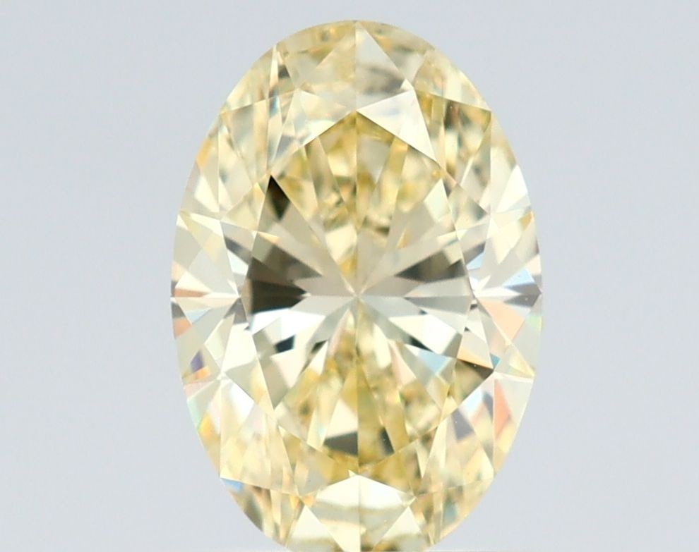 Loose Diamond - OVAL 1.0ct Fancy Light Yellow VS2: Loose Diamond - OVAL 1.0ct Fancy Light Yellow VS2 Source: Natural Shape: OVAL Carats: 1.0 Color: Fancy Light Yellow Certification: GIA Video: