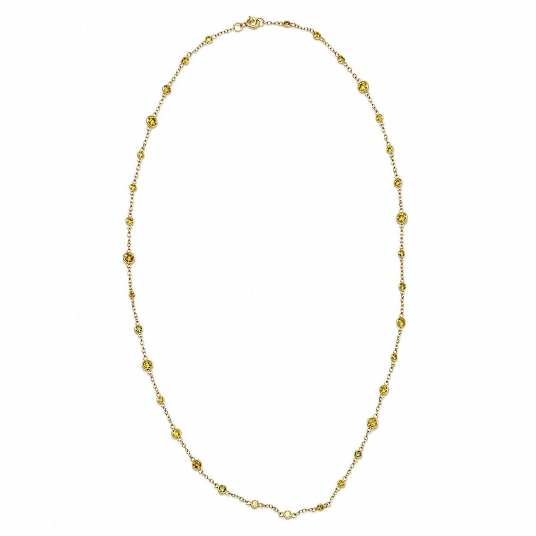 18K Yellow Gold Necklace with 34 Irradiated Diamonds 20 In: 18K Yellow Gold Necklace with 34 Irradiated Diamonds 20 In Pre-owned 18K yellow gold necklace featuring irradiated diamonds in a by-the-yard design. Specifications Item Type: Necklace Metal: 18K yello