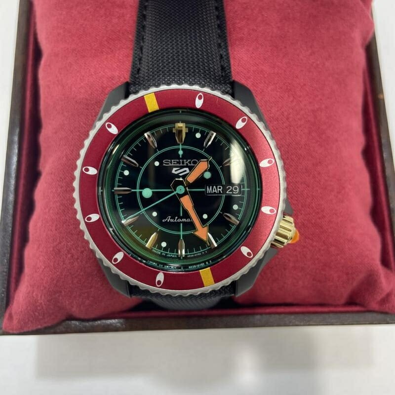 SEIKO SBSA037 Narancia Ghirga Golden Wind Wristwatch: SEIKO SBSA037 Narancia Ghirga Golden Wind Wristwatch Pre-owned SEIKO men's wristwatch from Japan, featuring a JoJo's Bizarre Adventure: Golden Wind Narancia Ghirga model. This opened item is an automa