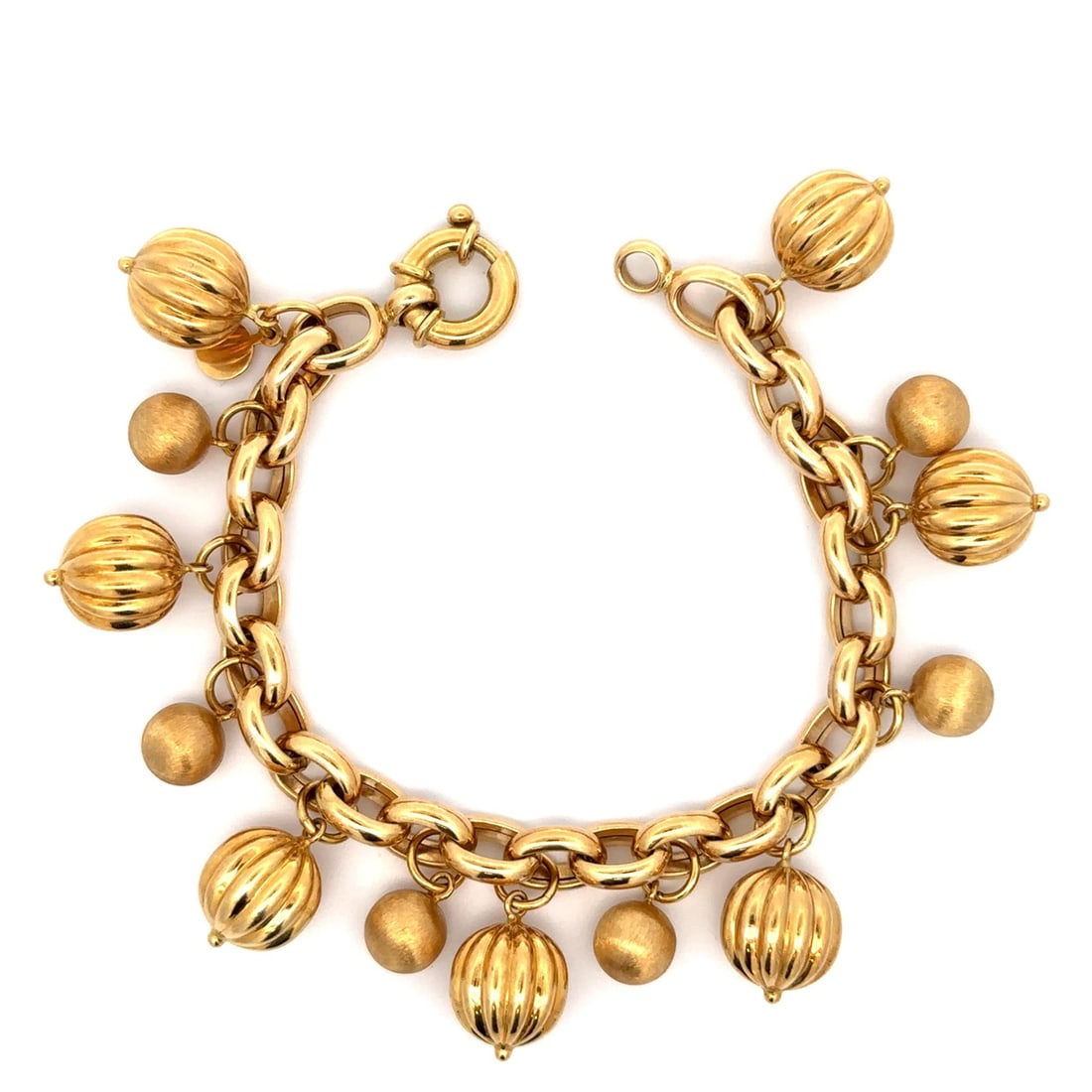 Italian 18k Yellow Gold Ball Bead Charm Bracelet Grooved Brushed Finish: Italian 18k Yellow Gold Ball Bead Charm Bracelet Grooved Brushed Finish Italian-made charm bracelet crafted in solid 18k yellow gold, featuring dangle ball beads with grooved and brushed finishes on a