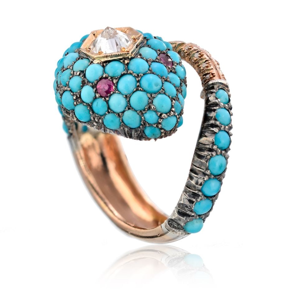Vintage Turquoise Serpent Snake Ring with Ruby Eyes and Diamond: Vintage Turquoise Serpent Snake Ring with Ruby Eyes and Diamond This stunning Turquoise Serpent Snake Diamond Ring is a unique vintage reproduction that showcases exceptional artistry. Crafted in both