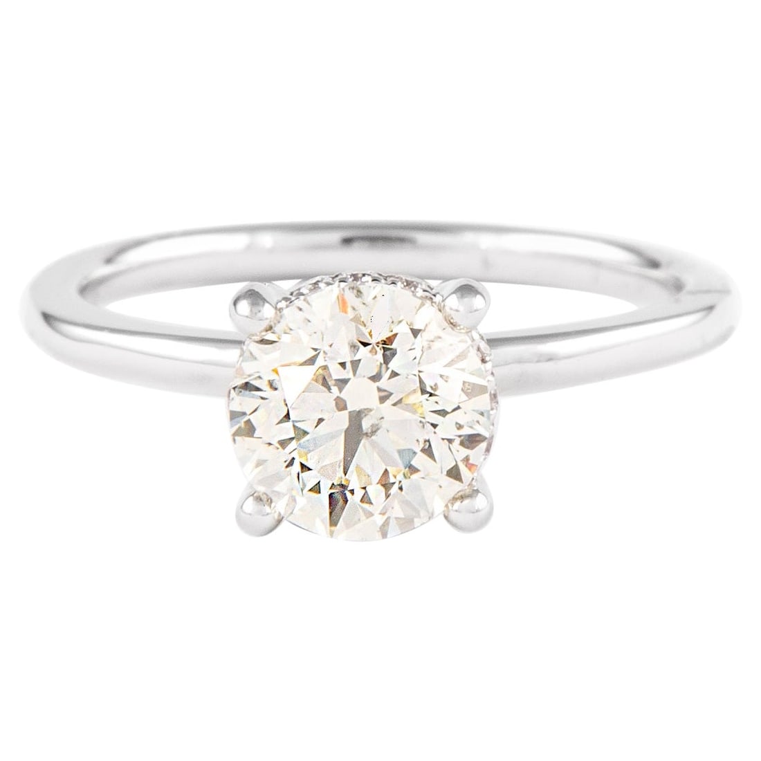 1.47 Carat Round Diamond Solitaire Ring 18K White Gold with Hidden Halo: 1.47 Carat Round Diamond Solitaire Ring 18K White Gold with Hidden Halo This exquisite 1.47 Carat Round Brilliant Diamond Solitaire Ring is crafted in luxurious 18 Karat White Gold. It features a stun