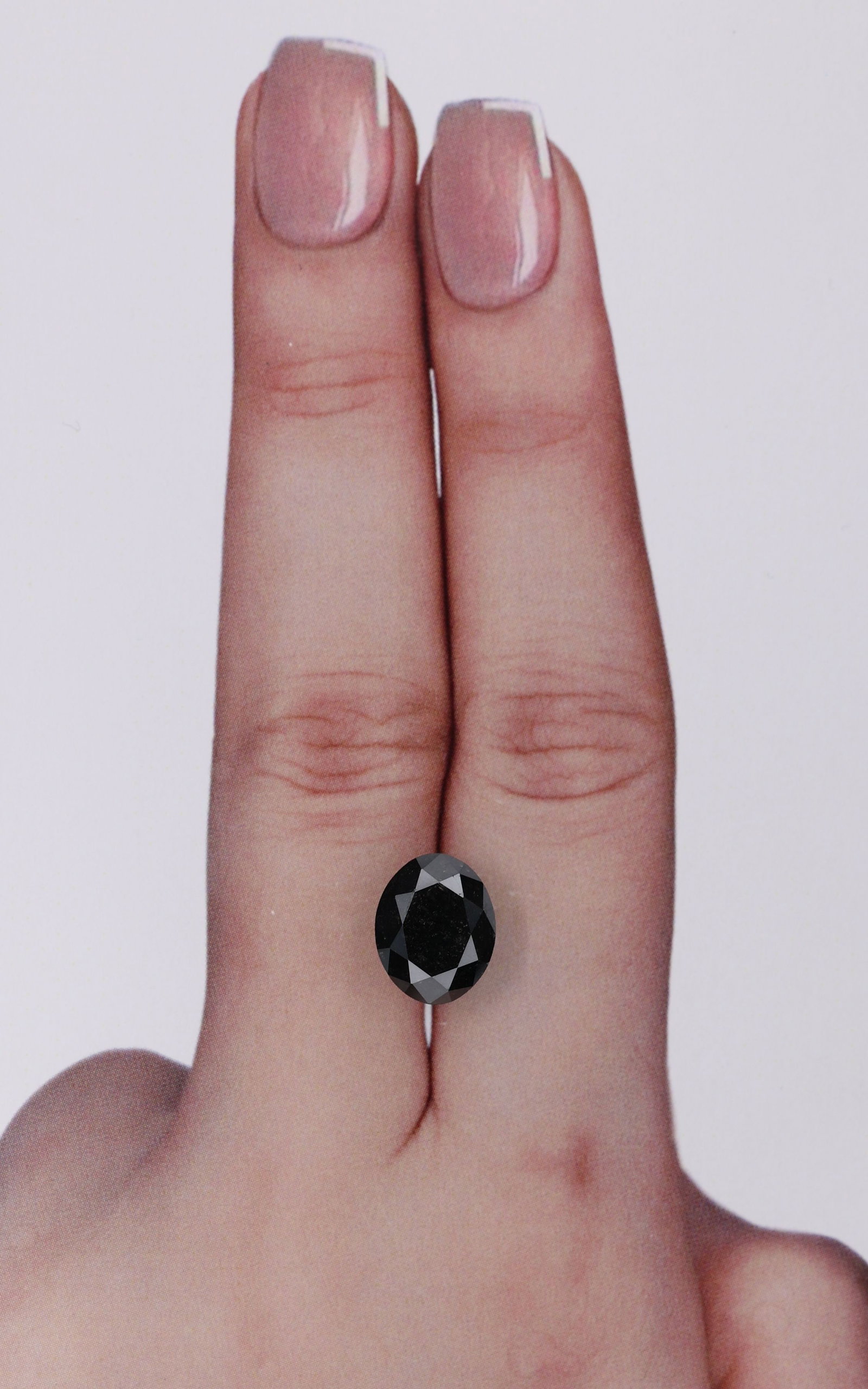 Loose Diamond - OVAL 3.04ct Black: Loose Diamond - OVAL 3.04ct Black Source: Natural Shape: OVAL Carats: 3.04 Color: Black Certification: IGI Video:
