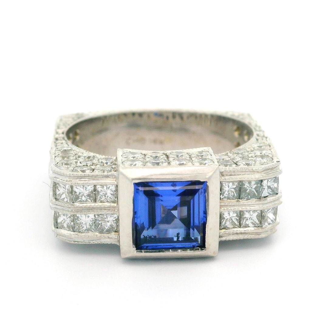 14k White Gold Blue Stone Diamond Cocktail Band Ring Size 11.5: 14k White Gold Blue Stone Diamond Cocktail Band Ring Size 11.5 This stunning unisex ring features a unique cocktail style, crafted from solid 14k white gold. The centerpiece is a striking blue stone w