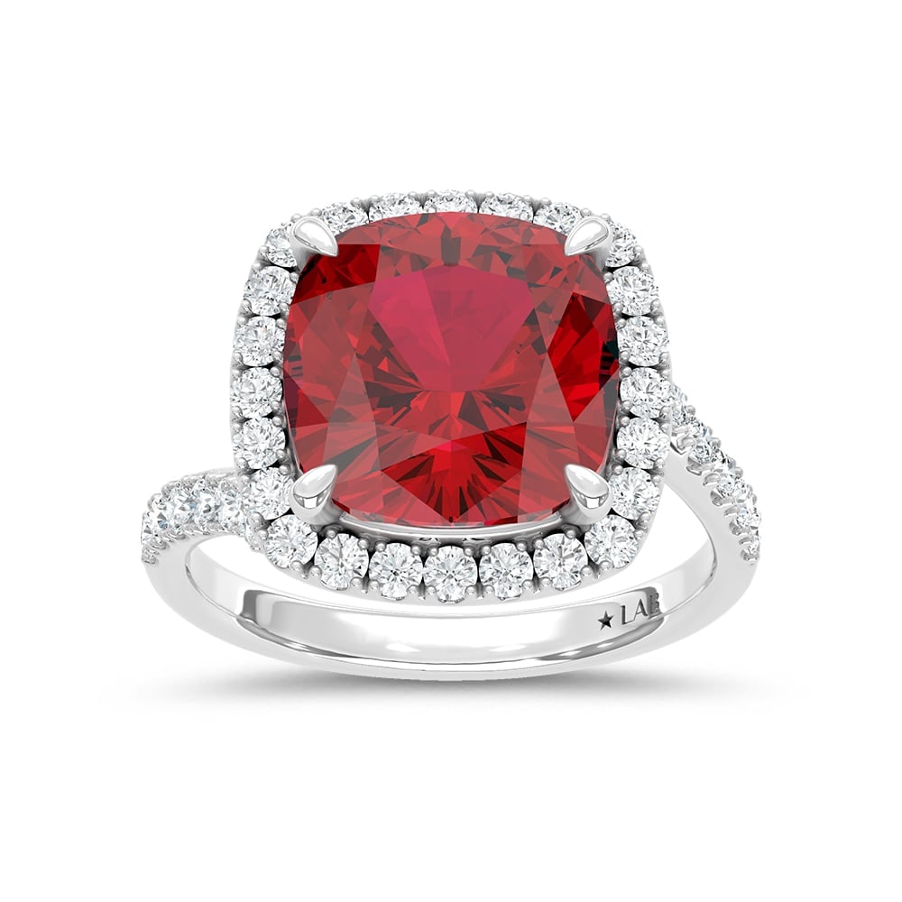 14K White Gold Lab Grown Diamond 8 1/2 Ct.Tw. Cushion Shape Recrystalized Ruby Engagement Ring: 14K White Gold Lab Grown Diamond 8 1/2 Ct.Tw. Cushion Shape Recrystalized Ruby Engagement Ring (Center 7 3/4 ct) Exude elegance with this breathtaking 14K white gold engagement ring. The centerpiece i
