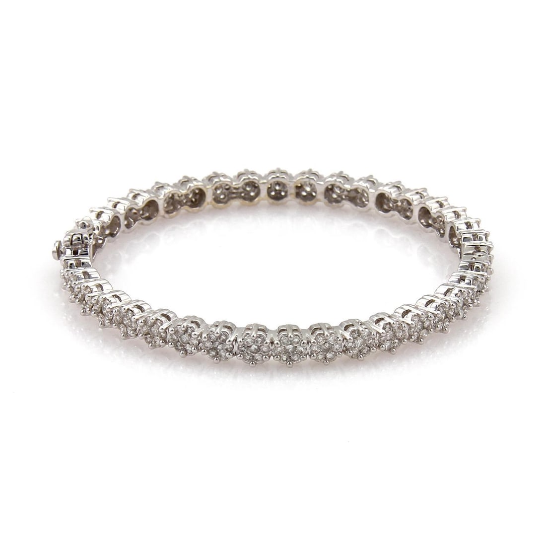 Stunning 4.50ct Diamond Cluster Bangle in 14k White Gold: Stunning 4.50ct Diamond Cluster Bangle in 14k White Gold Experience the elegance of this Modern Diamond Cluster Bracelet, meticulously crafted from 14k white gold with a fine polished finish. This stu