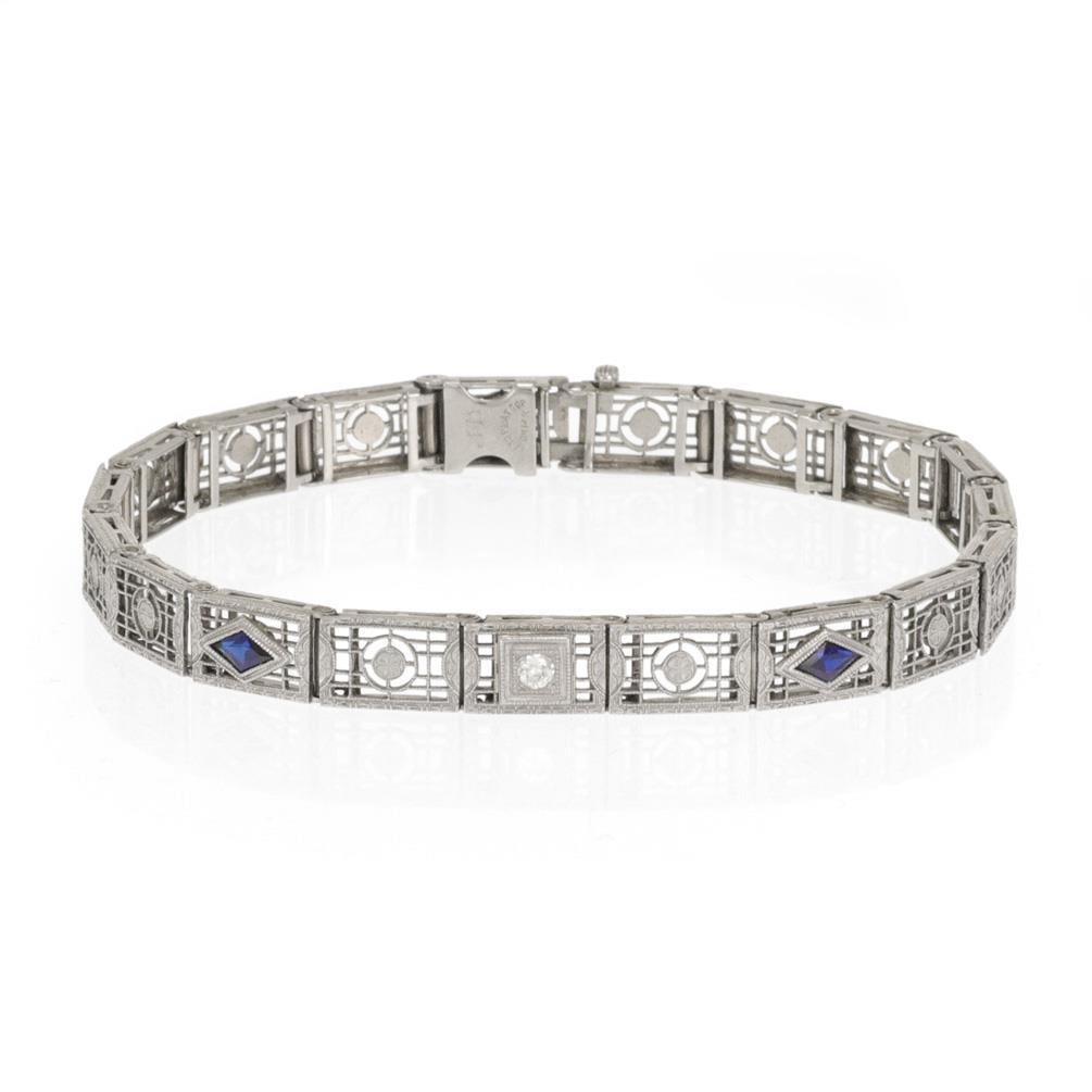 Art Deco Platinum 14k White Gold Diamond Gate Link Bracelet: Art Deco Platinum 14k White Gold Diamond Gate Link Bracelet This exquisite Art Deco bracelet features a stunning design with a platinum top and a 14k white gold rectangular gate link frame. Each link 