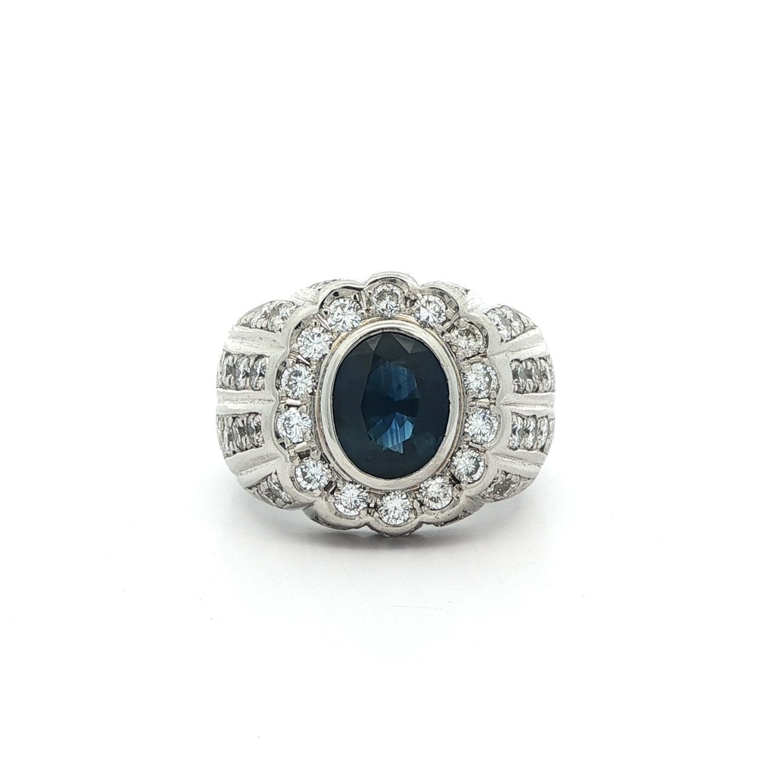 Vintage Platinum 3.6ctw GIA Oval Sapphire Diamond Band Ring: Vintage Platinum 3.6ctw GIA Oval Sapphire Diamond Band Ring This stunning vintage platinum band ring showcases a magnificent natural oval brilliant cut sapphire, weighing 2.19ct and displaying a deep 