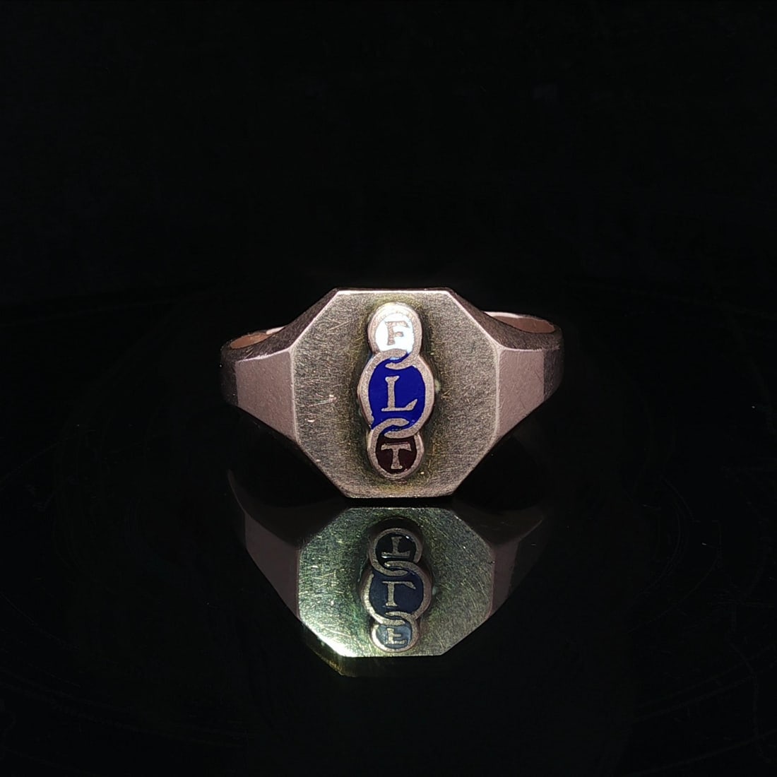 FLT Initial Signet Ring 10k Rosy Yellow Gold Art Nouveau Enamel: FLT Initial Signet Ring 10k Rosy Yellow Gold Art Nouveau Enamel This antique Art Nouveau signet ring features the initials "FLT" and is crafted from solid 10k rosy yellow gold, accented with white, bl