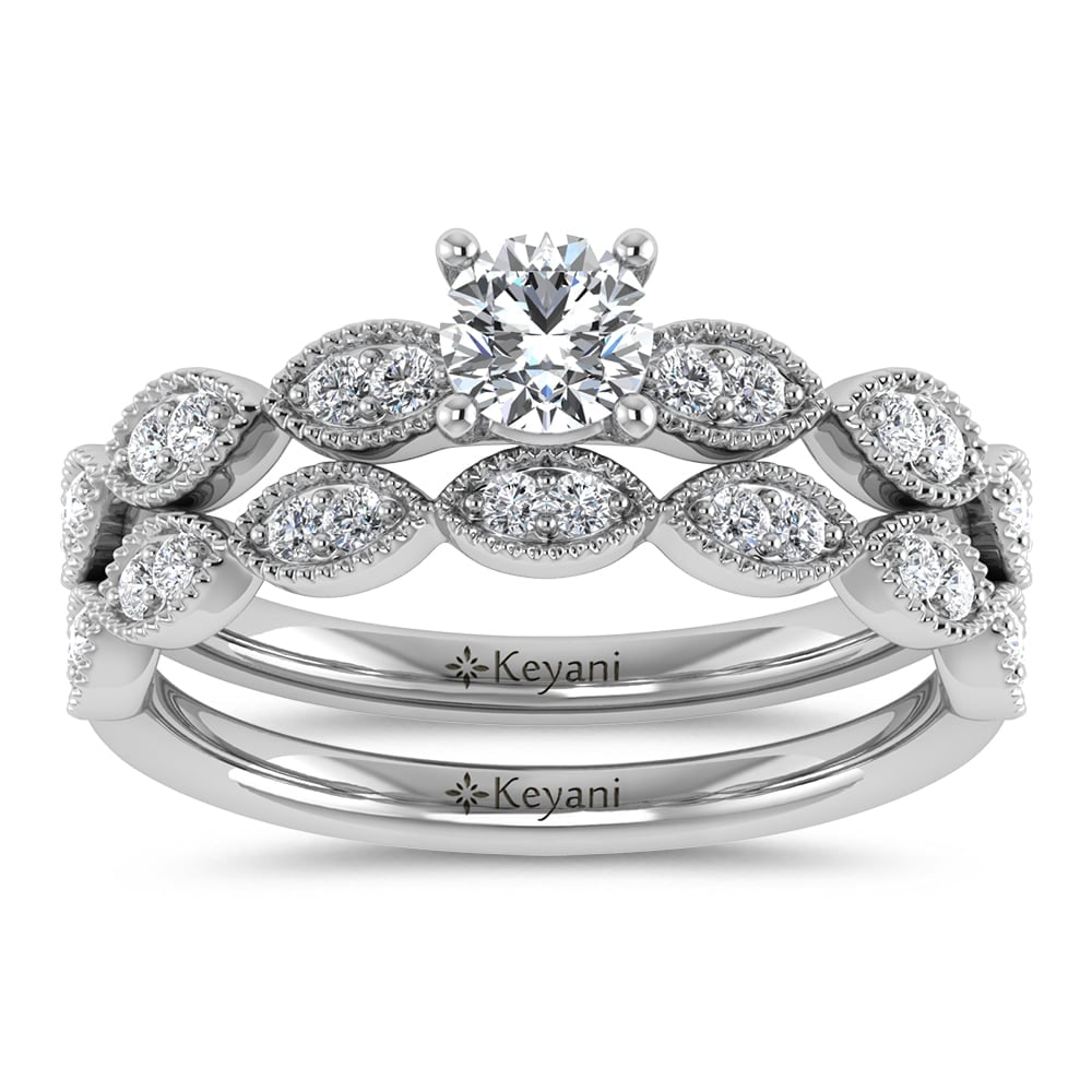Diamond 1/2 Ct.Tw. Round Cut Bridal Ring in 14K White Gold: Diamond 1/2 Ct.Tw. Round Cut Bridal Ring in 14K White Gold 14k White Gold Stone Color: G-h Stone Clarity: Si2 Each ring is presented in standard size 6.5. Complimentary resizing is available between