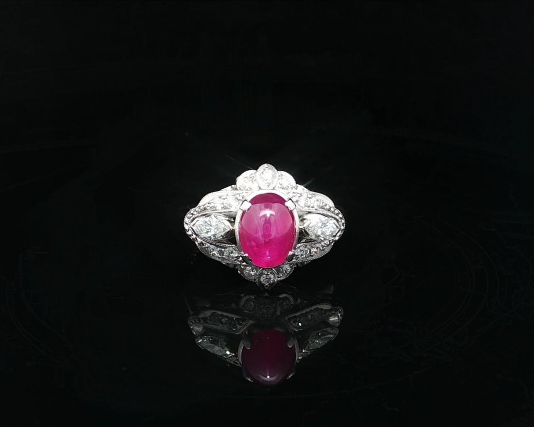 Vintage Platinum GIA Certified 2.72ctw Star Ruby Diamond Cocktail Ring: Vintage Platinum GIA Certified 2.72ctw Star Ruby Diamond Cocktail Ring This exquisite vintage cocktail ring showcases a stunning 2.72ctw cabochon star ruby, accented beautifully by round and marquise 