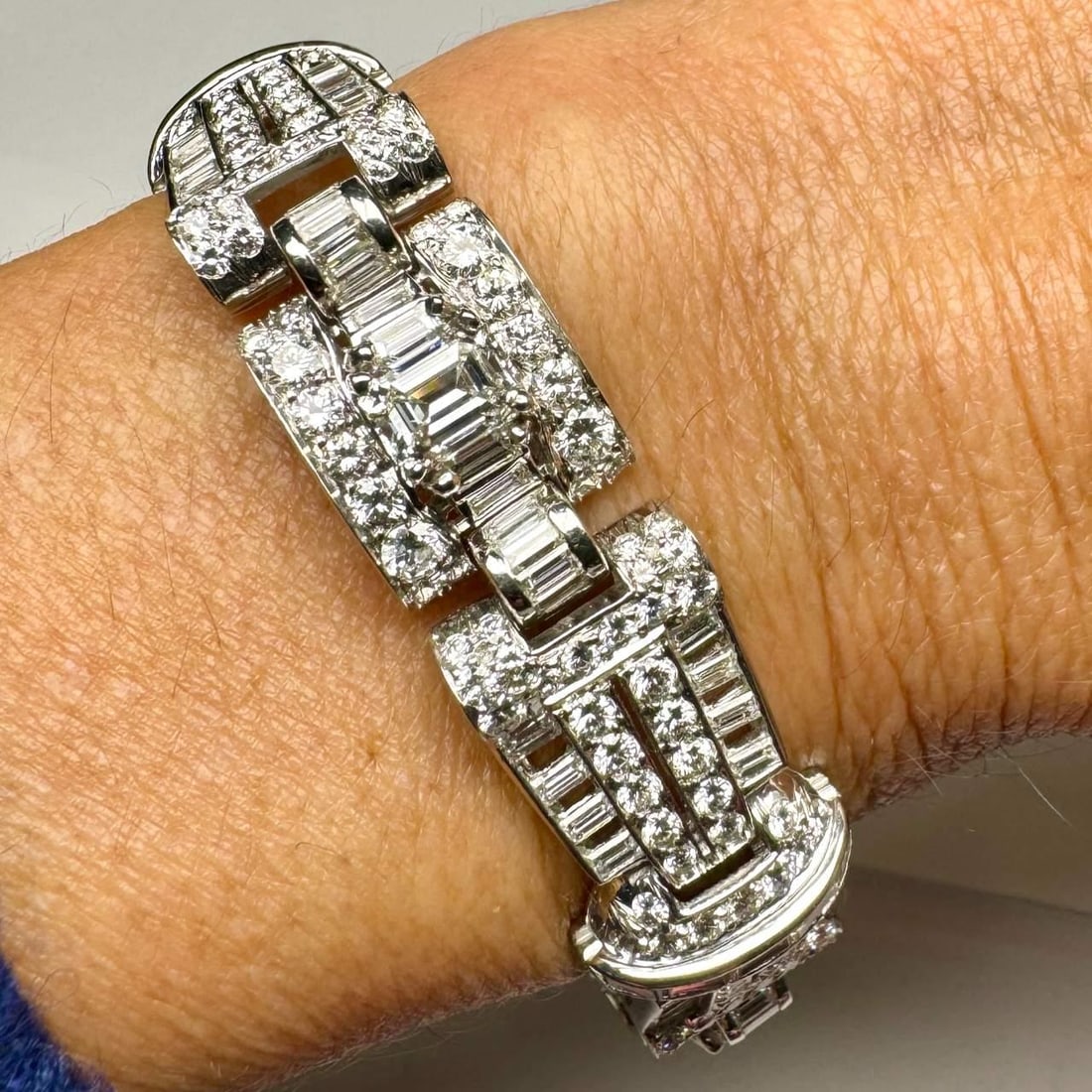 Art Deco Platinum Diamond Bracelet 25.20 Ct Emerald-Cut 3 Diamonds D-E Color: Art Deco Platinum Diamond Bracelet 25.20 Ct Emerald-Cut 3 Diamonds D-E Color This exquisite Art Deco bracelet is crafted in platinum and showcases a stunning total diamond weight of 25.20 carats. The 