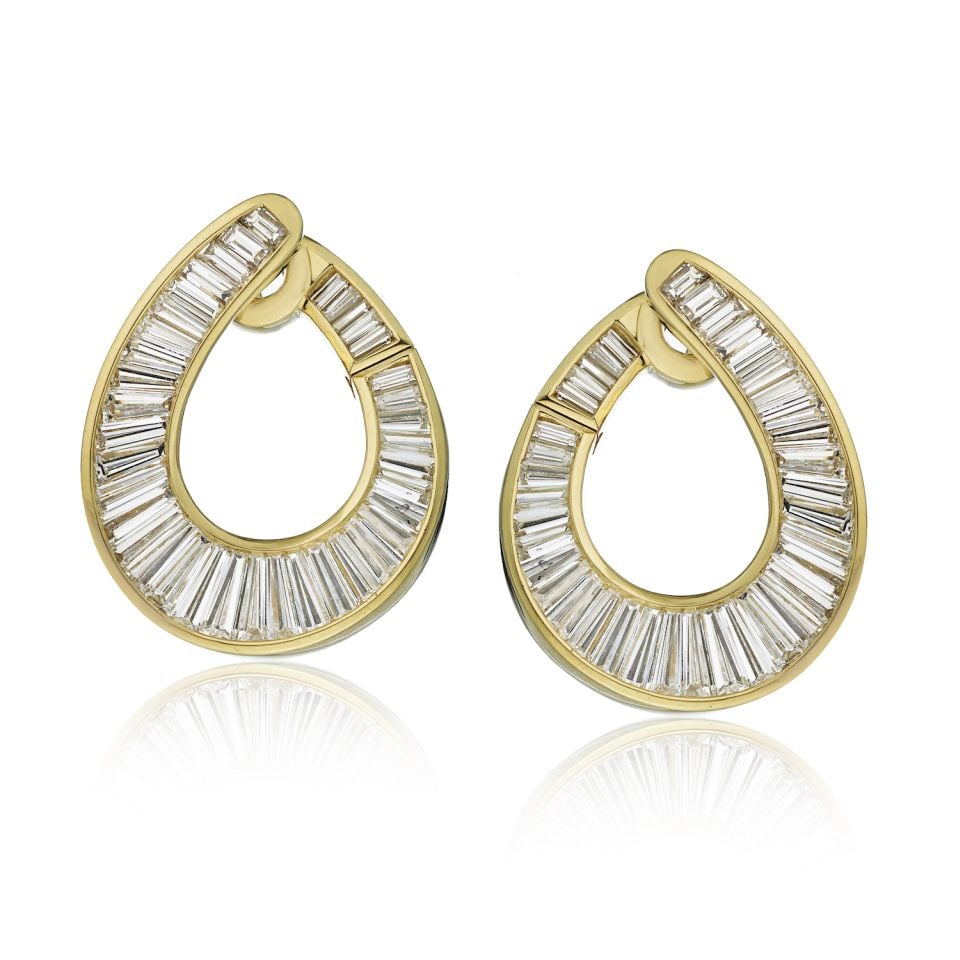 Oscar Heyman 18K Yellow Gold 7 Carat Baguette Diamond Earrings: Oscar Heyman 18K Yellow Gold 7 Carat Baguette Diamond Earrings These exquisite earrings from Oscar Heyman showcase luxurious 18K yellow gold, elegantly adorned with stunning baguette cut diamonds. Wit