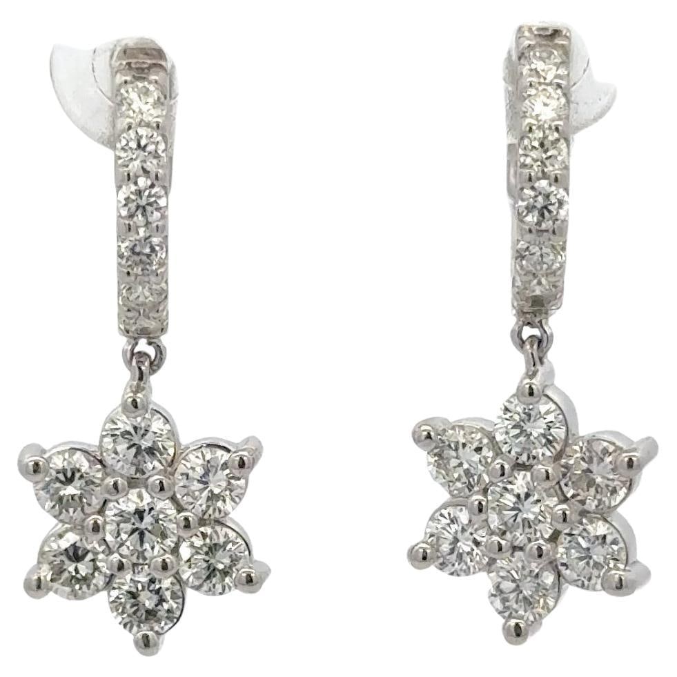 Stunning 14K White Gold Diamond Cluster Drop Earrings 2.09ct G-H VS2-SI1: Stunning 14K White Gold Diamond Cluster Drop Earrings 2.09ct G-H VS2-SI1 Exquisite 14 karat white gold drop earrings that showcase a dazzling cluster of diamonds. These contemporary earrings feature a