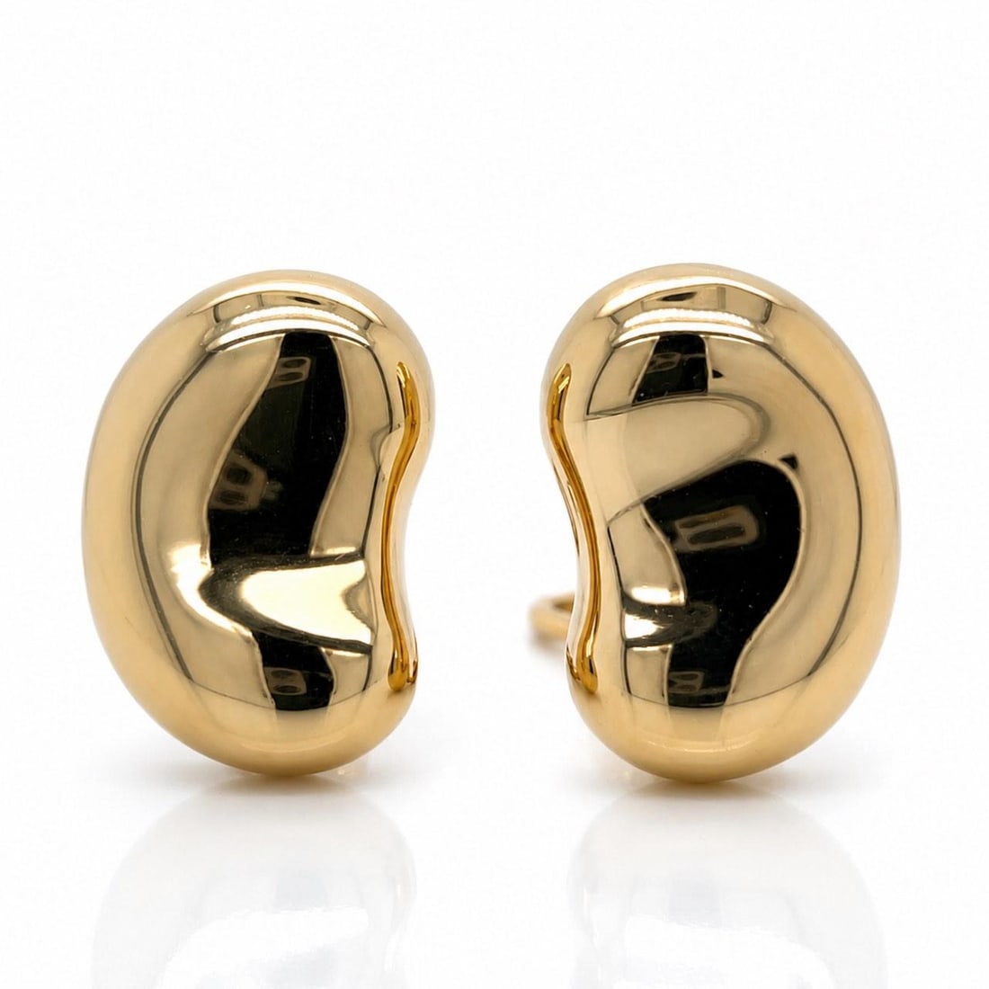 Elsa Peretti Bean Earrings Tiffany 18K Yellow Gold Box Pouch: Elsa Peretti Bean Earrings Tiffany 18K Yellow Gold Box Pouch These Tiffany & Co. Elsa Peretti Bean earrings are crafted from 18K yellow gold. The earrings measure 19.7 x 12.5 mm and have a total weigh
