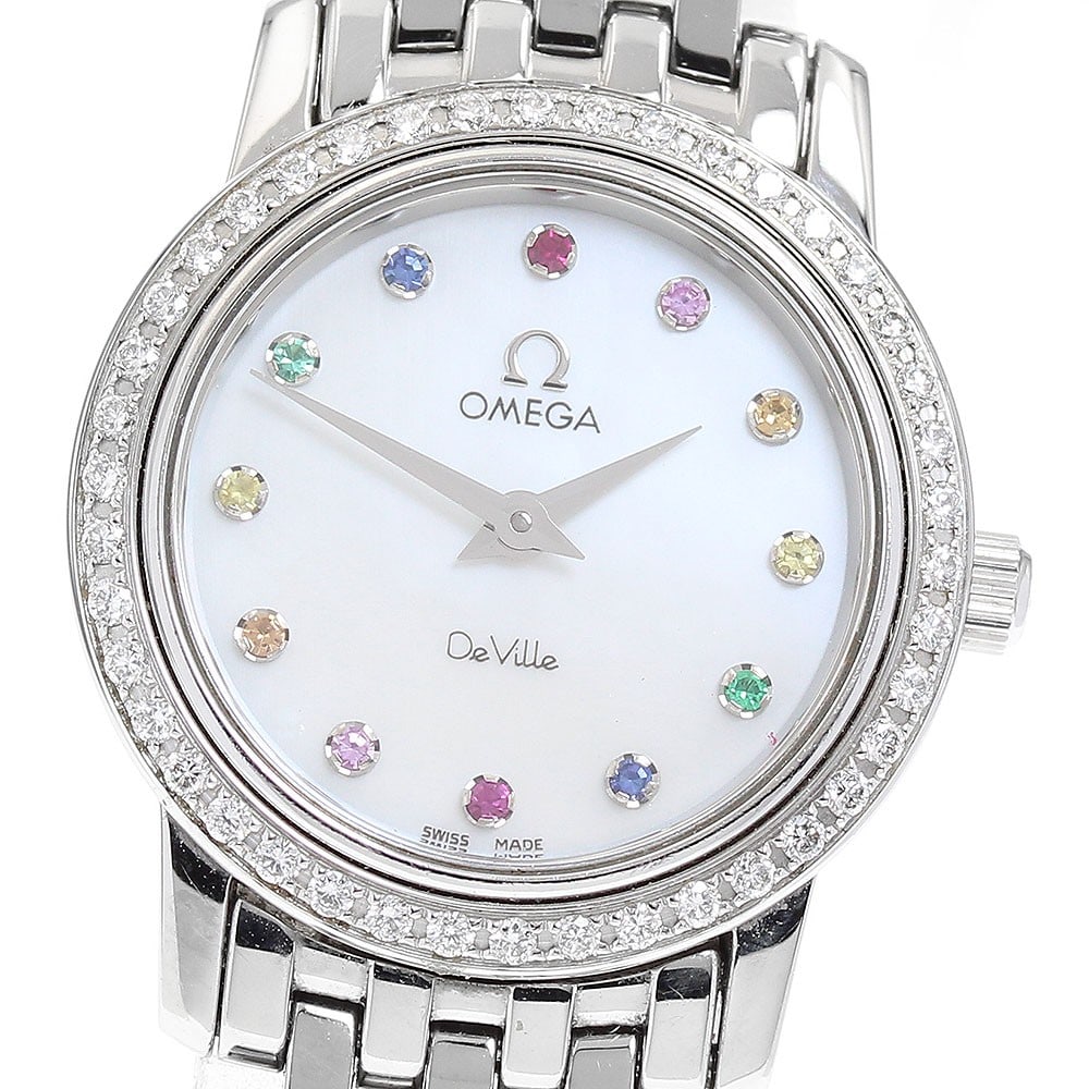 Omega De Ville 4577.77 Ladies Quartz Watch Diamond Bezel MOP Dial: Omega De Ville 4577.77 Ladies Quartz Watch Diamond Bezel MOP Dial Pre-owned OMEGA De Ville ladies wristwatch with a diamond bezel and 12-diamond design. This quartz model features a white mother-of-pe