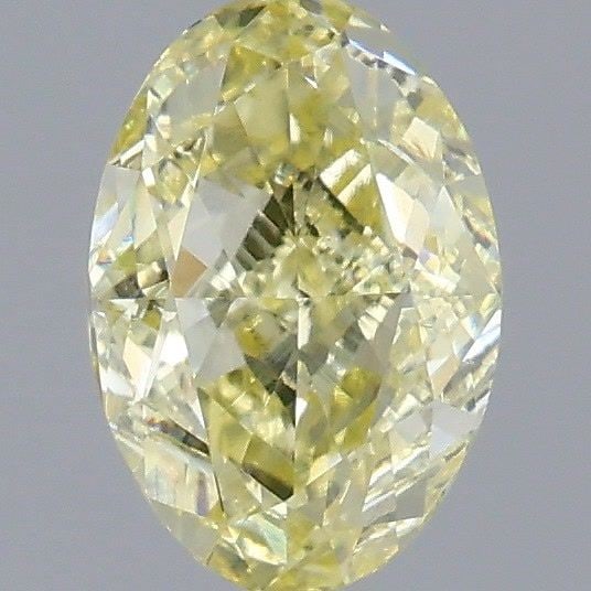 Loose Diamond - OVAL 0.7ct Fancy Yellow VVS2: Loose Diamond - OVAL 0.7ct Fancy Yellow VVS2 Source: Natural Shape: OVAL Carats: 0.7 Color: Fancy Yellow Certification: GIA Video: