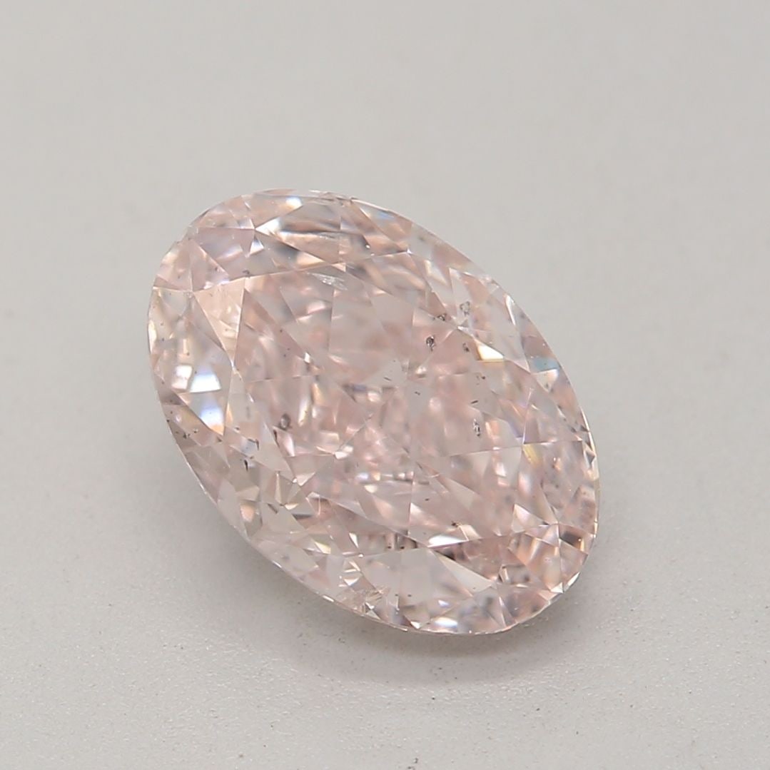 Loose Diamond - OVAL 1.02ct Fancy Light Orangey Pink SI2: Loose Diamond - OVAL 1.02ct Fancy Light Orangey Pink SI2 Source: Natural Shape: OVAL Carats: 1.02 Color: Fancy Light Orangey Pink Certification: GIA Video: