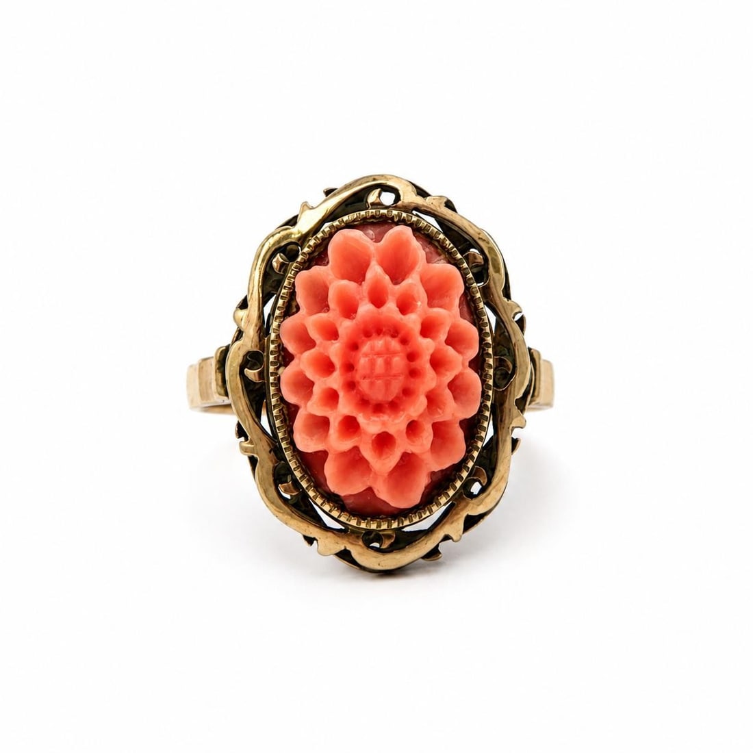 Victorian 9-10k Yellow Gold Ring with Carved Coral Flower: Victorian 9-10k Yellow Gold Ring with Carved Coral Flower Antique Victorian dinner ring featuring a carved natural coral flower in an open work design. The ring is crafted in solid 9-10k yellow gold a