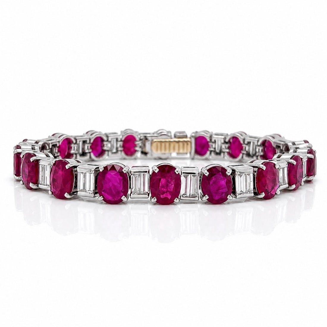 BVLGARI Burma Ruby Diamond Bracelet Platinum 18K GIA Certified: BVLGARI Burma Ruby Diamond Bracelet Platinum 18K GIA Certified Platinum and 18K bracelet set with Burma heated rubies and baguette diamonds. It weighs 36.4 grams and measures 6.75 inches in length. Th