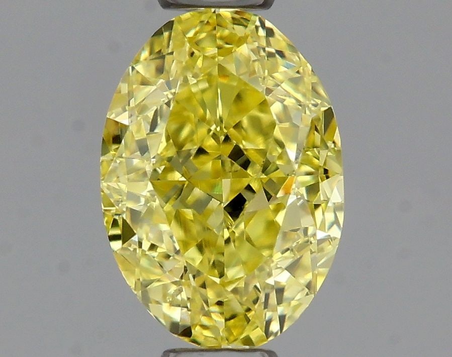 Loose Diamond - OVAL 0.7ct Fancy Intense Yellow SI2: Loose Diamond - OVAL 0.7ct Fancy Intense Yellow SI2 Source: Natural Shape: OVAL Carats: 0.7 Color: Fancy Intense Yellow Certification: GIA Video: