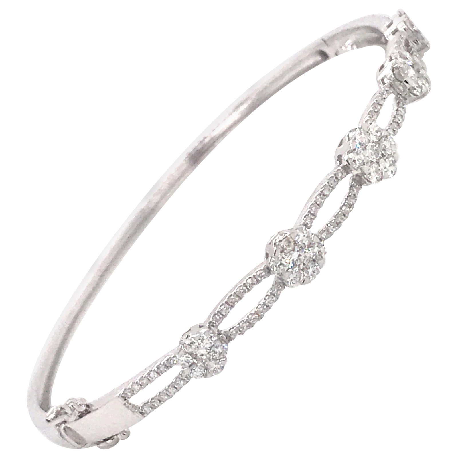 Harbor Diamonds Floral Diamond Swirl Bangle 1.24ct 18K White Gold: Harbor Diamonds Floral Diamond Swirl Bangle 1.24ct 18K White Gold This exquisite 18K white gold bangle showcases a stunning graduated floral and swirl design, adorned with dazzling round cut diamonds 