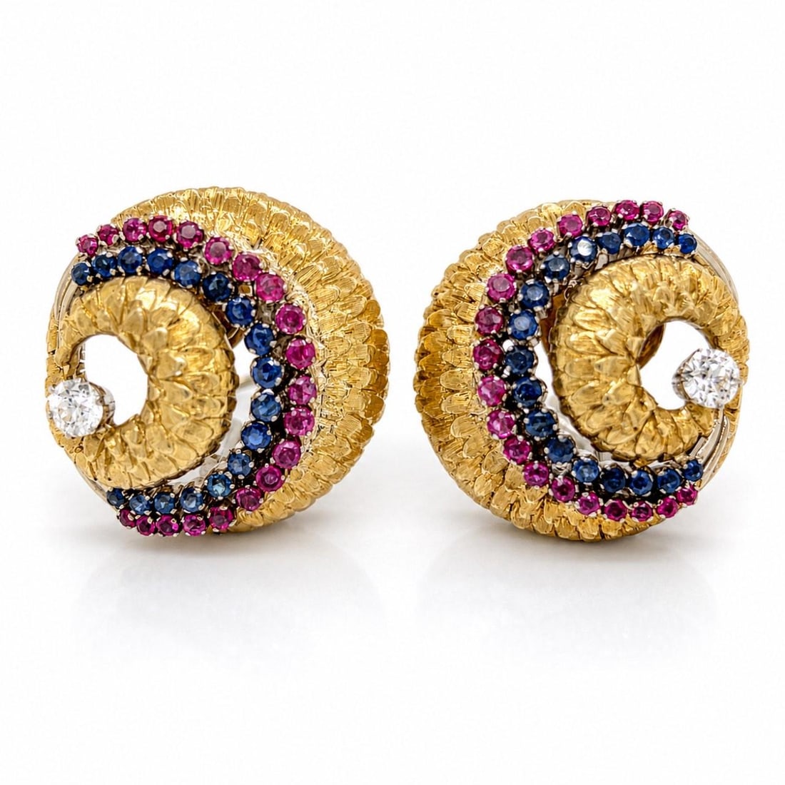 18K Yellow Gold Earrings with Burma Rubies Sapphires and Diamonds: 18K Yellow Gold Earrings with Burma Rubies Sapphires and Diamonds Vintage 1960s earrings crafted in 18K yellow gold and set with Burma rubies, Burma sapphires, and European-cut diamonds. These pre-own