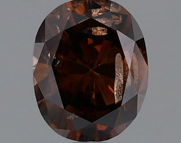 Loose Diamond - OVAL 0.73ct Fancy Dark Orangey Brown: Loose Diamond - OVAL 0.73ct Fancy Dark Orangey Brown Source: Natural Shape: OVAL Carats: 0.73 Color: Fancy Dark Orangey Brown Certification: GIA Video: