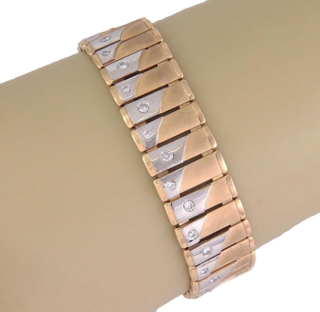 Unbranded 14k Two Tone Gold Link Bracelet with 1.20 CTW Diamonds: Unbranded 14k Two Tone Gold Link Bracelet with 1.20 CTW Diamonds Vintage estate wide bar link bracelet crafted in 14k yellow and white gold with natural diamond accents. The two-tone design features a