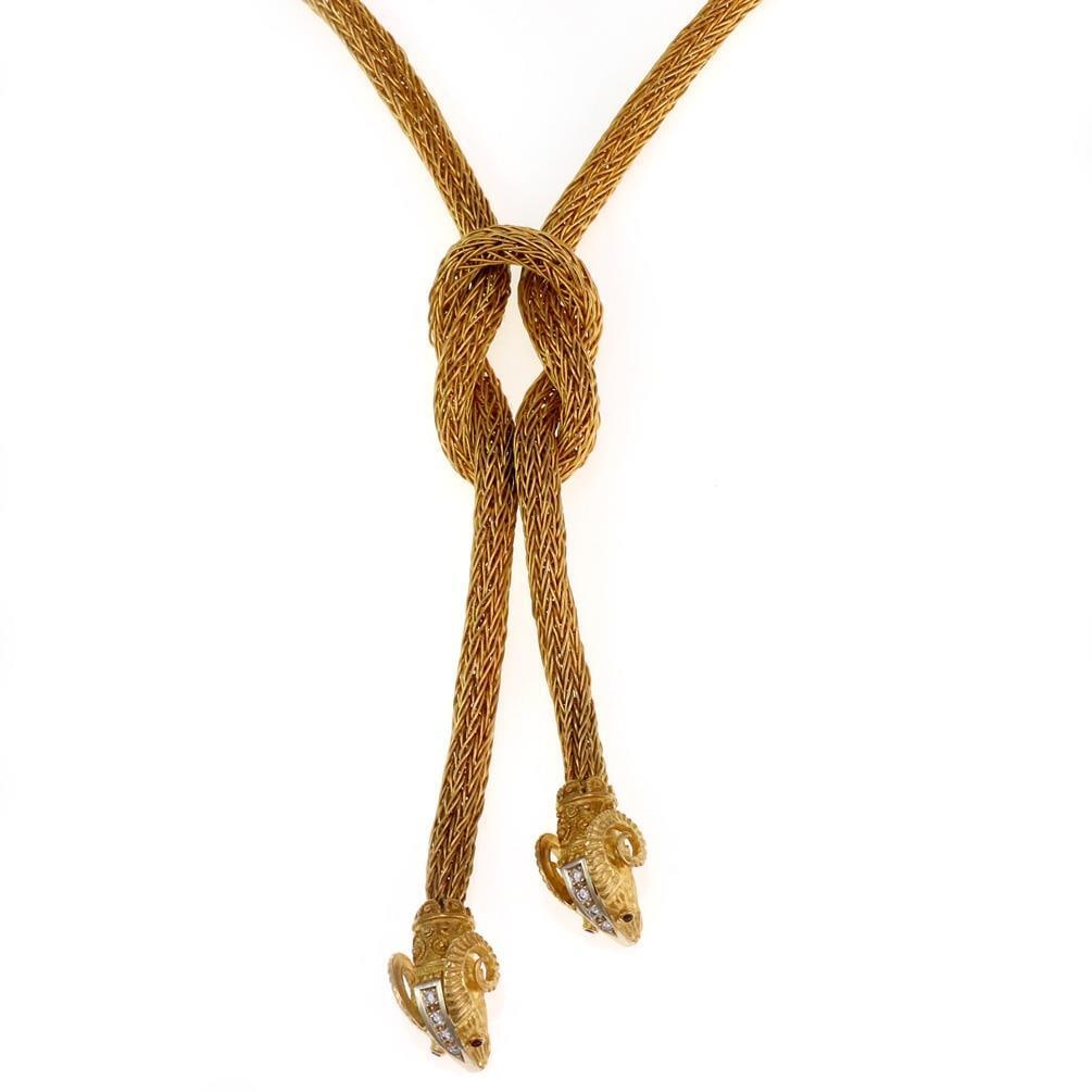 18k Gold Ram Head Necklace Diamond Ruby Pendant 132.4g: 18k Gold Ram Head Necklace Diamond Ruby Pendant 132.4g This striking necklace is expertly crafted from 18k yellow gold with white gold accents and features a 6mm thick weave link design. The centerpie