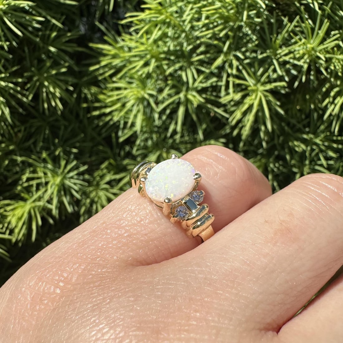 Unbranded 14k Yellow Gold Opal Diamond Cocktail Ring with Grooved Shank: Unbranded 14k Yellow Gold Opal Diamond Cocktail Ring with Grooved Shank Pre-owned women's cocktail ring crafted in solid 14k yellow gold, featuring an oval cabochon natural opal accented by four natur