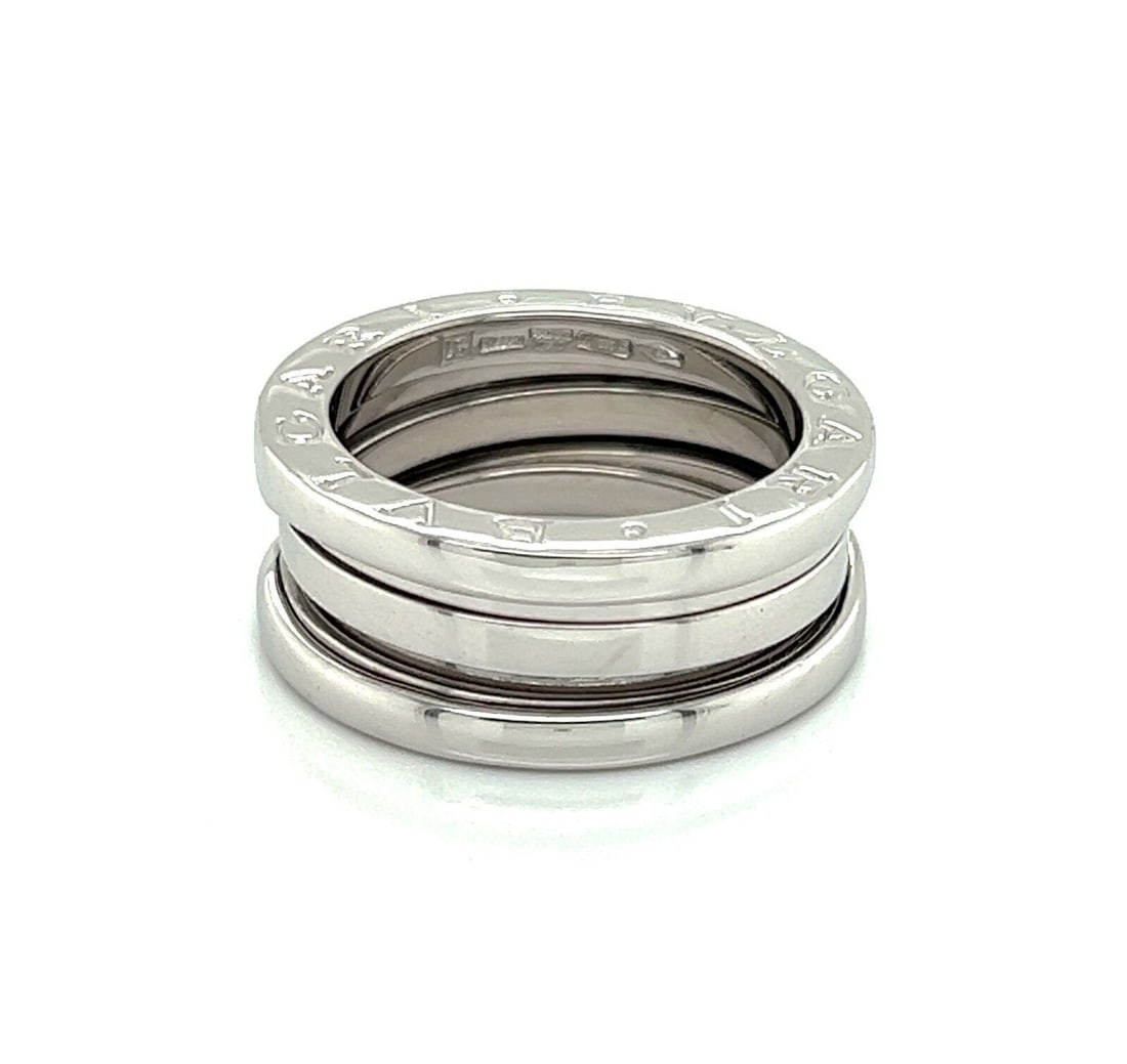Bvlgari B.zero1 18k White Gold Three Band Ring US 5.25 EU 51: Bvlgari B.zero1 18k White Gold Three Band Ring US 5.25 EU 51 Pre-owned Bvlgari B.zero1 Three-Band ring crafted in 18k white gold. This signed ring features the collection's iconic sculptural spiral de