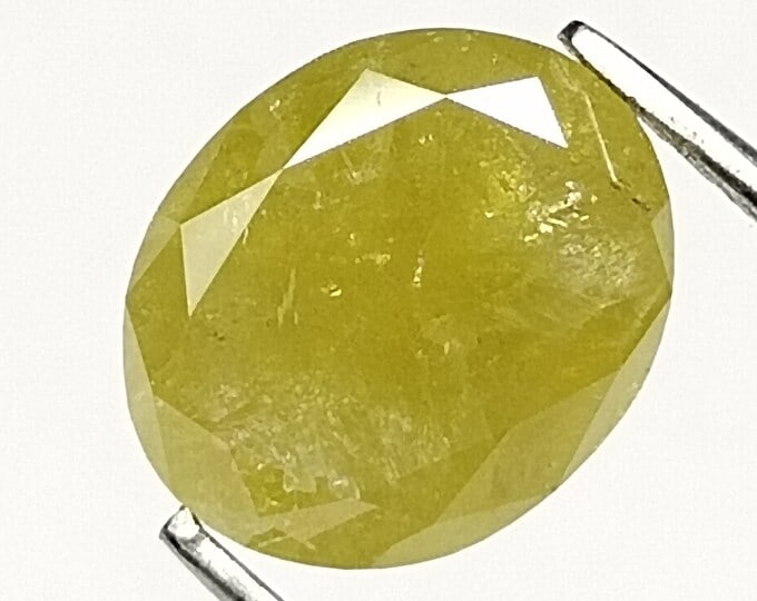 Loose Diamond - OVAL 2.04ct Yellow I3: Loose Diamond - OVAL 2.04ct Yellow I3 Source: Natural Shape: OVAL Carats: 2.04 Color: Yellow Certification: NONE PLEASE NOTE: Framed, Large, or heavy items do not have shipping costs included. The exa