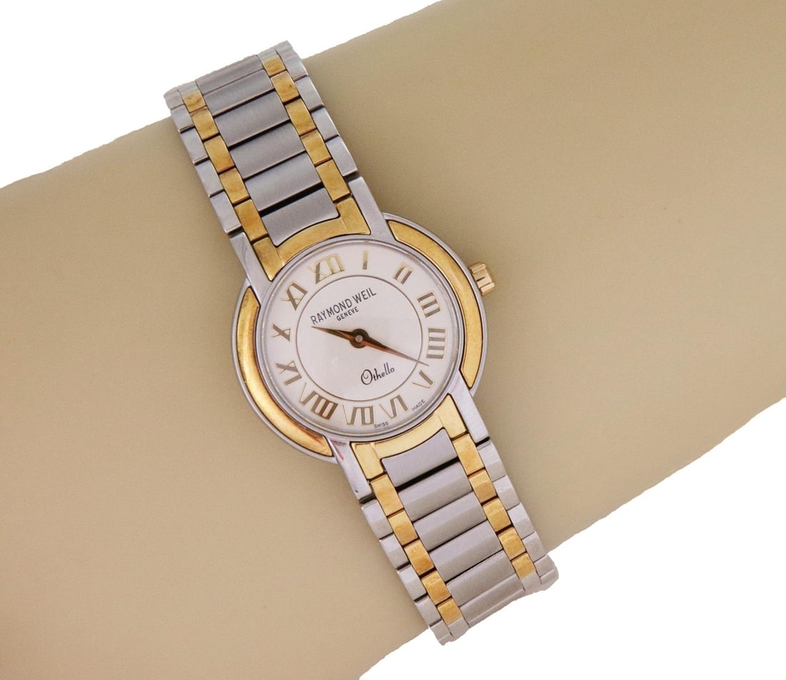 Raymond Weil Othello Ladies Quartz Wristwatch Steel and Gold Tone: Raymond Weil Othello Ladies Quartz Wristwatch Steel and Gold Tone This elegant Raymond Weil Othello ladies' quartz watch showcases a stunning blend of stainless steel and yellow gold accents. The stai