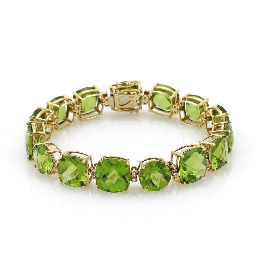 Elegant 55ct Peridot Diamond 14k Yellow Gold Bracelet: Elegant 55ct Peridot Diamond 14k Yellow Gold Bracelet This elegant bracelet features a sophisticated design crafted from 14k yellow gold with a polished finish. It showcases both cushion and round cut